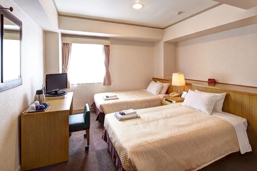Okinawa Sun Plaza Hotel Наха Экстерьер фото